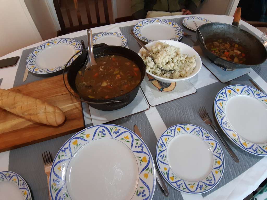 A table set out with food to be served.
