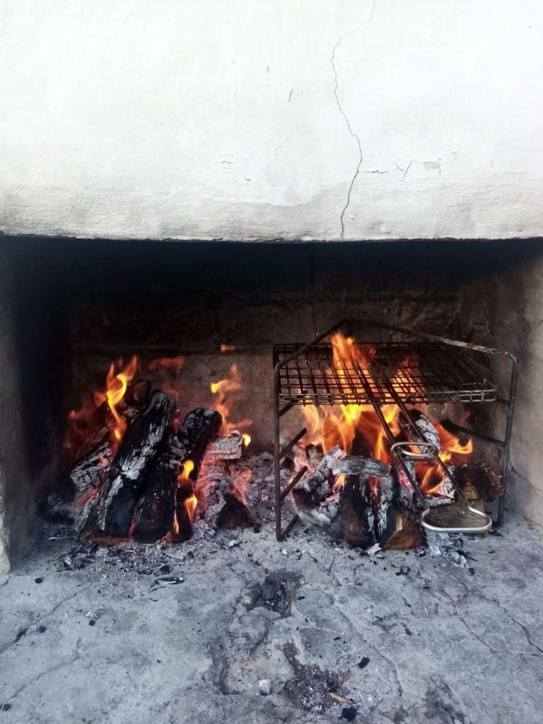 A wood fire in the braai area at fonteintjies.